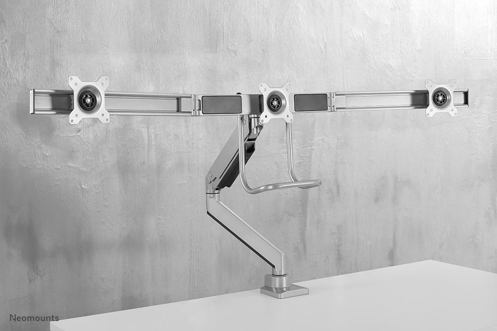 Neomounts NM-D775DX3 plata es un soporte de escritorio con resorte de gas, barra transversal y palanca para pantallas planas de hasta 27 pulgadas (68,6 cm).