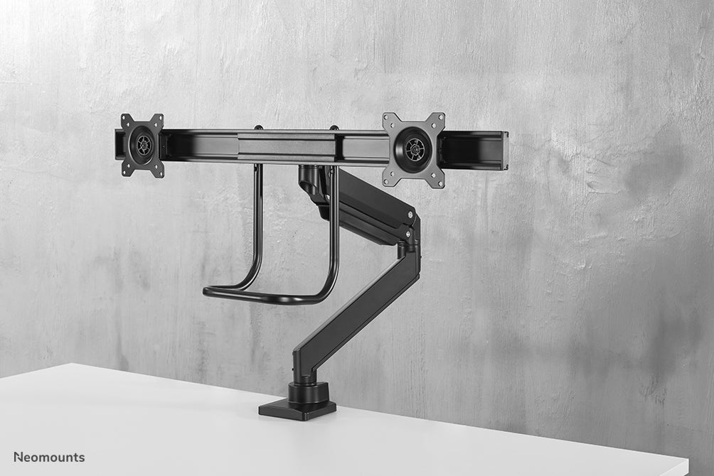 Neomounts NM-D775DX negro es un soporte de escritorio con resorte de gas, barra transversal y palanca para pantallas planas de hasta 32 pulgadas (81 cm).